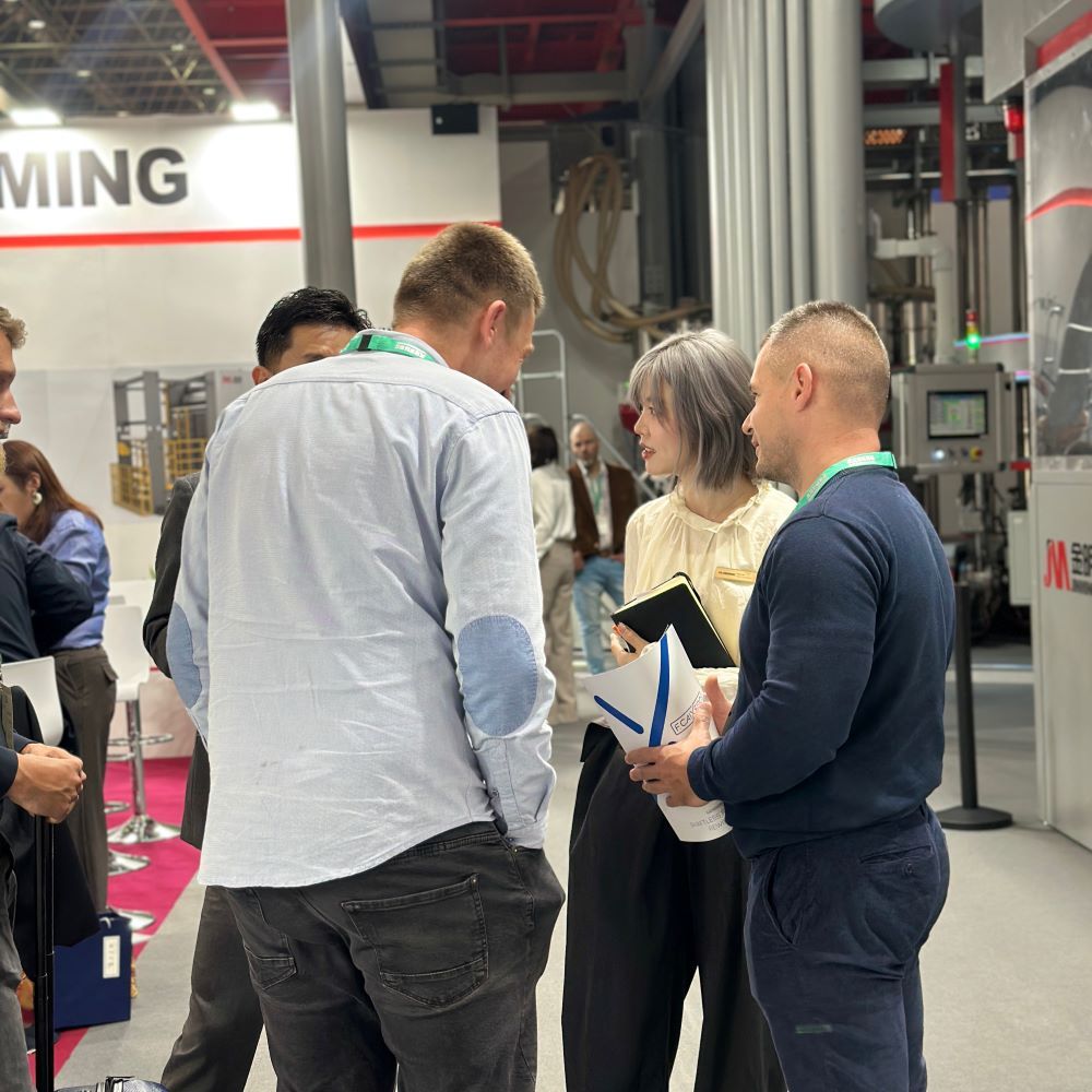 Jin Ming engaged in on-site communication with the clients regarding high-performance and sustainable packaging solutions