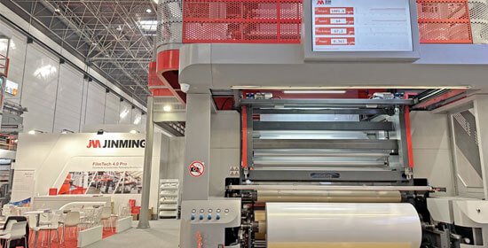 Jinming Participated K-2022 exhibition in Dusseldorf Germany, showing 5-layer co-extrusion blown film line with the breakthrough success to reach output capacity of 1000kg/hr in film width of 2100mm